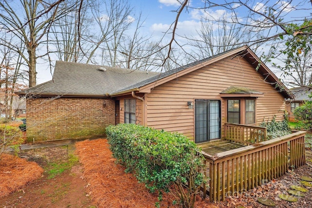 view of front of house featuring a wooden deck