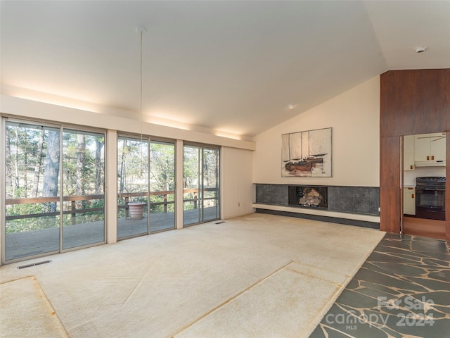 living room with ceiling fan, carpet floors, and high vaulted ceiling