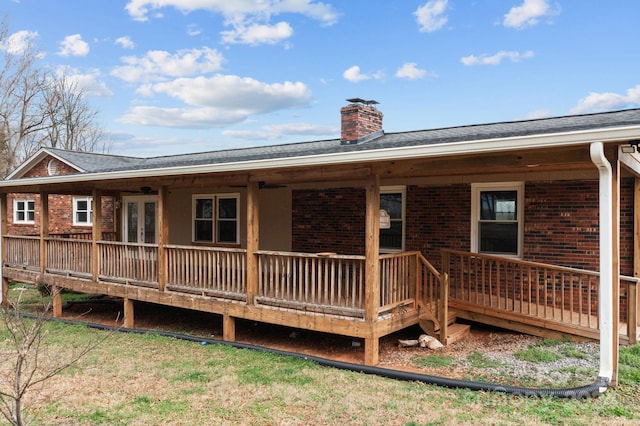 back of property featuring a deck