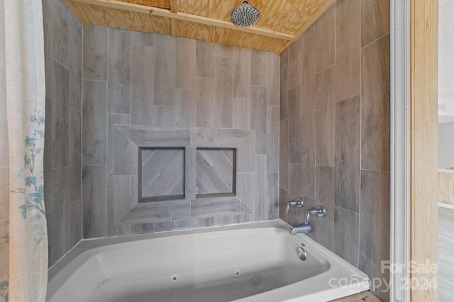 bathroom featuring tiled shower / bath combo