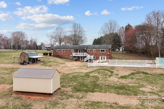 exterior space featuring a storage shed and a pool