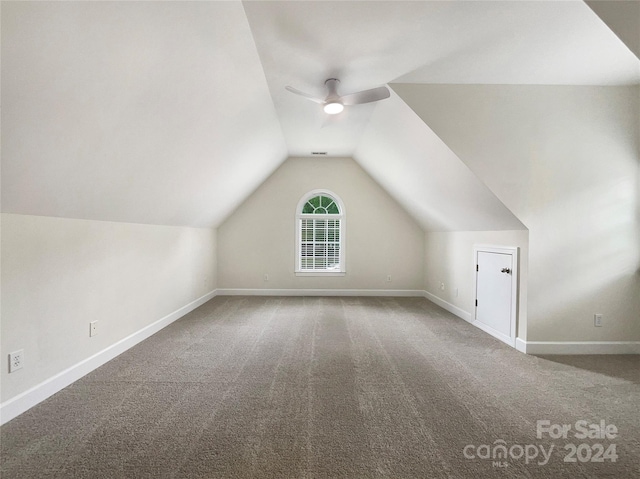 bonus room with ceiling fan, carpet floors, and vaulted ceiling