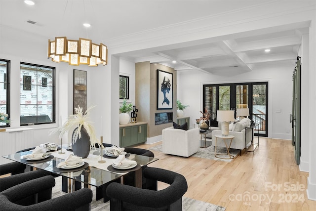 living room with beamed ceiling, french doors, light hardwood / wood-style floors, and coffered ceiling