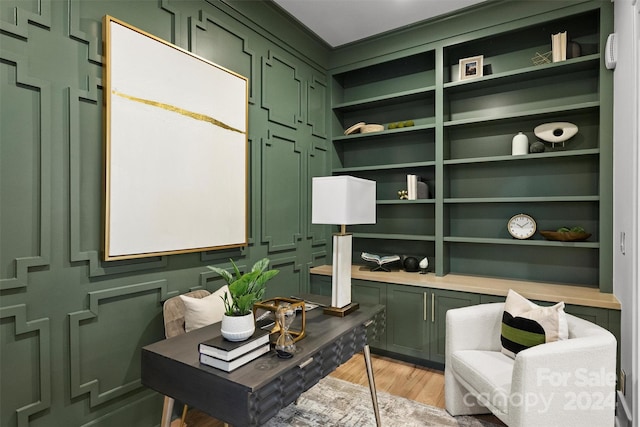 home office featuring hardwood / wood-style flooring