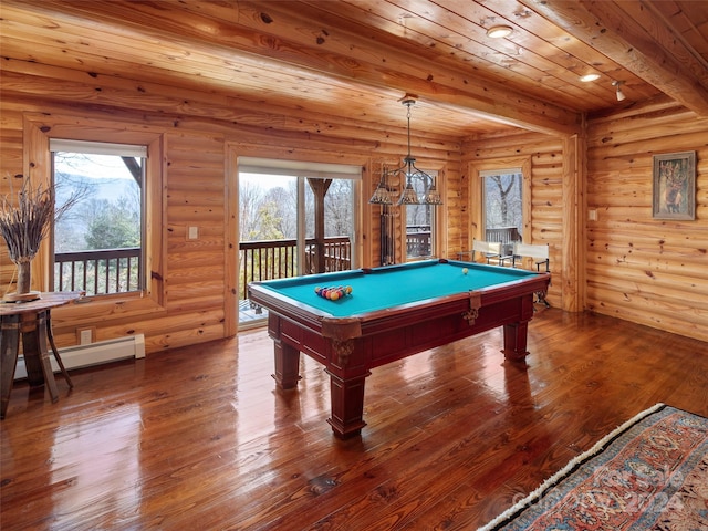 rec room with beam ceiling, wood-type flooring, rustic walls, and a baseboard radiator