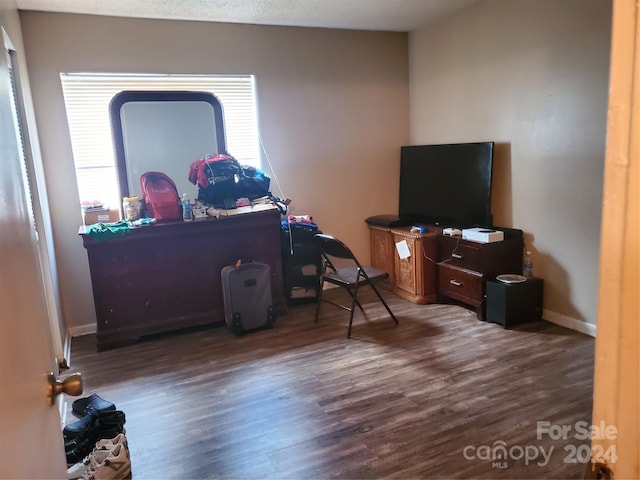 home office featuring dark hardwood / wood-style floors