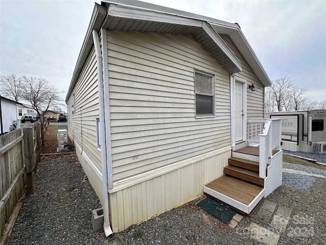 view of property exterior featuring central AC