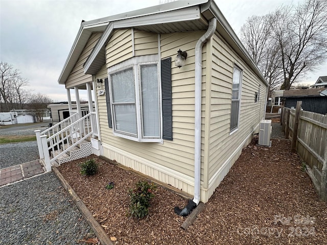 view of home's exterior with central air condition unit