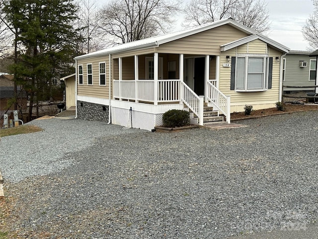 manufactured / mobile home with a porch