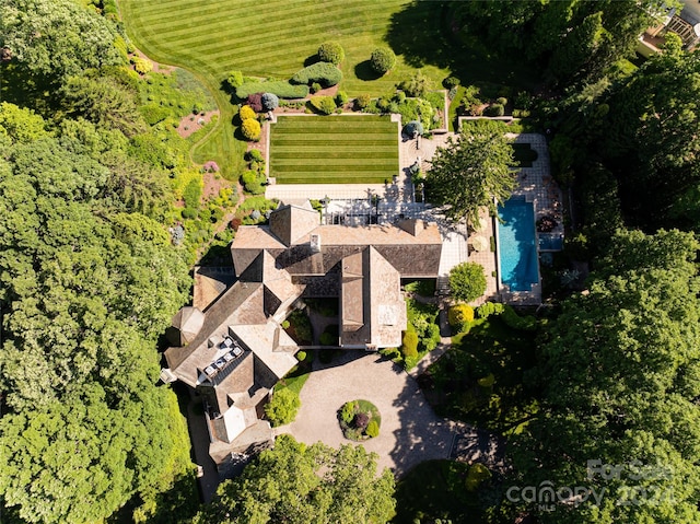 birds eye view of property with a rural view