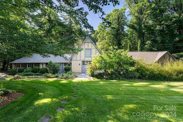 exterior space with a front yard