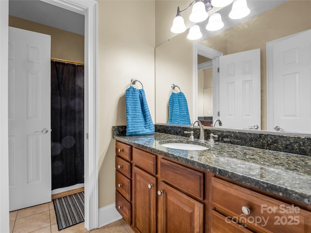 bathroom featuring vanity, tile patterned floors, and a shower with shower curtain