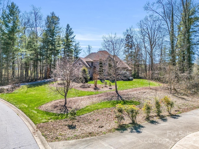 view of front of property with a front lawn