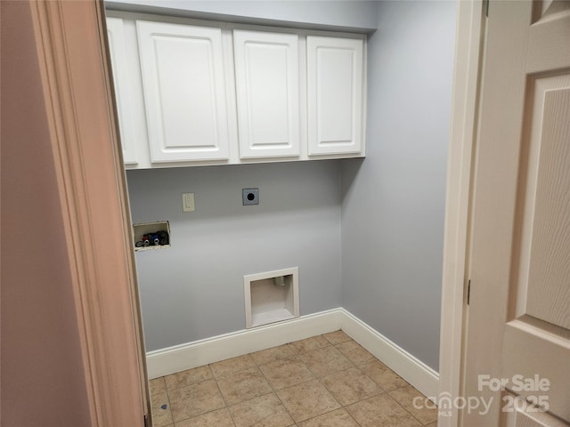 washroom featuring cabinets, washer hookup, and electric dryer hookup