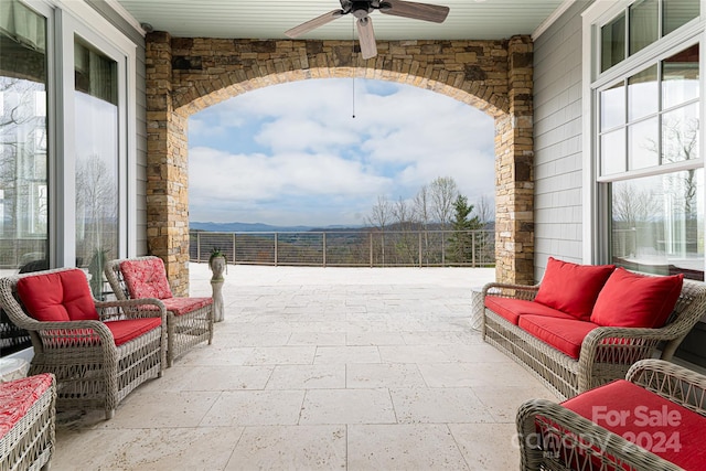 view of patio / terrace featuring ceiling fan and outdoor lounge area