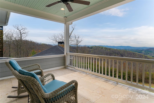 view of patio featuring ceiling fan