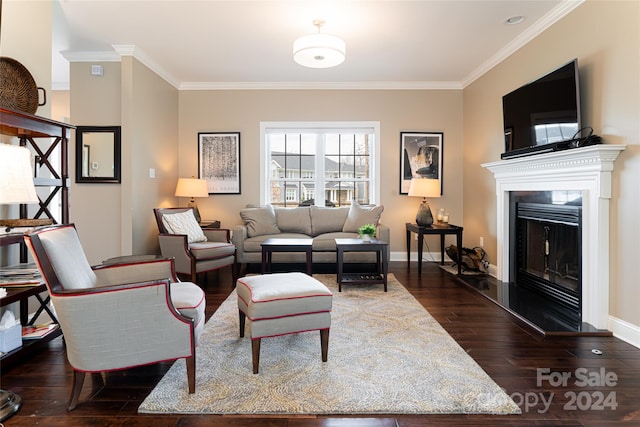 living room featuring dark wood-type flooring and ornamental molding