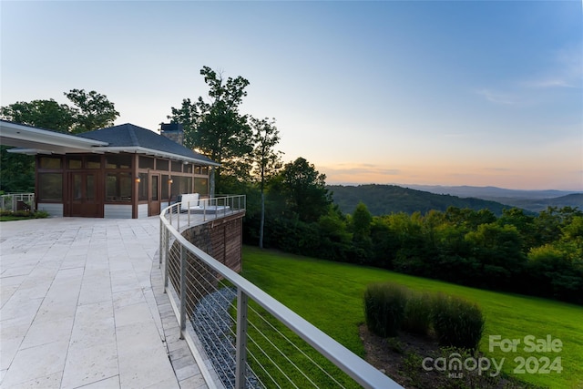 exterior space featuring a mountain view