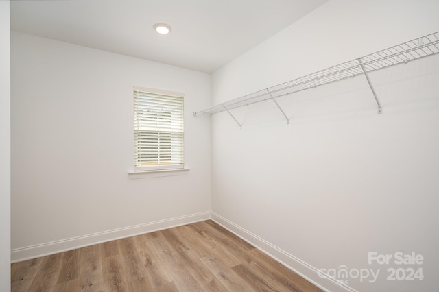 walk in closet featuring light wood-type flooring