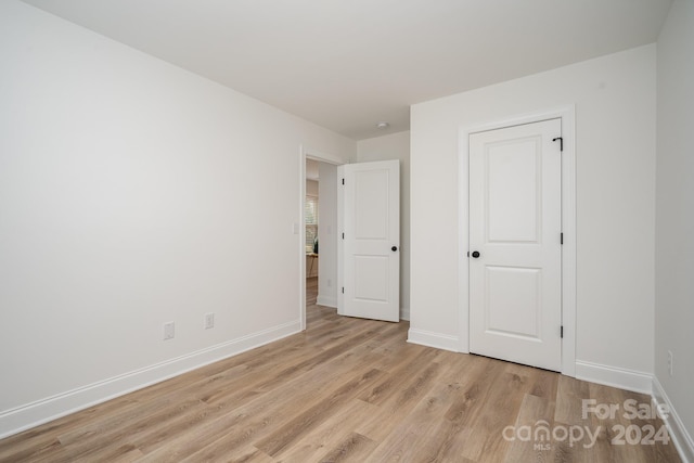 unfurnished bedroom featuring light hardwood / wood-style floors