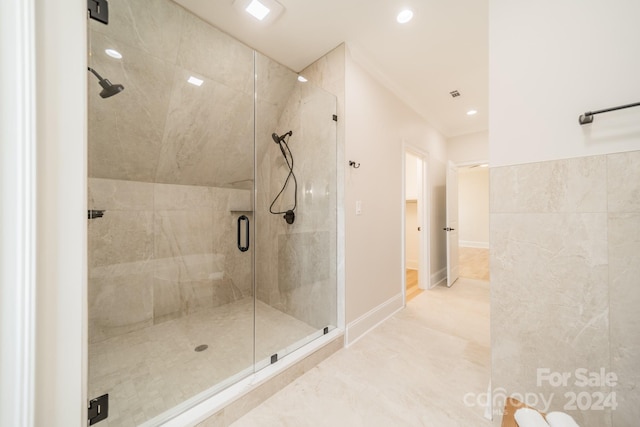 bathroom with an enclosed shower