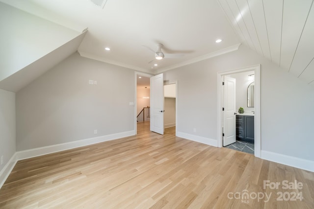 bonus room featuring light wood-type flooring, ceiling fan, and lofted ceiling