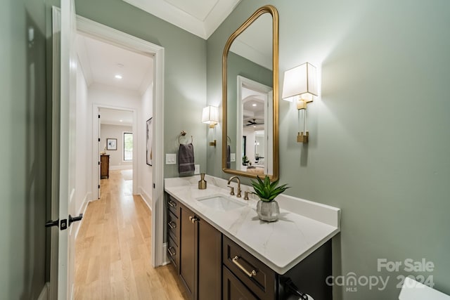 bathroom featuring vanity and hardwood / wood-style floors