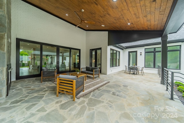 view of patio featuring ceiling fan and outdoor lounge area