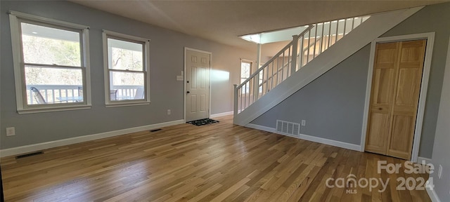 entrance foyer with light hardwood / wood-style floors