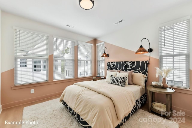 bedroom featuring light hardwood / wood-style floors