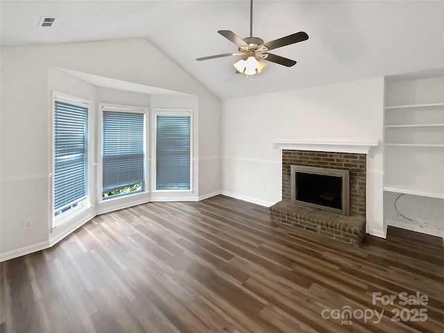 7210 Morningdew Ct, Denver, NC 28037 - unfurnished living room with a ceiling fan, a fireplace, dark wood-style flooring, and lofted ceiling