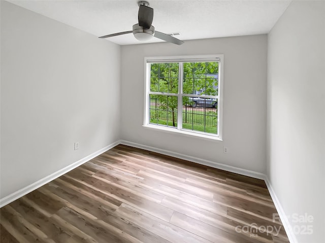 7210 Morningdew Ct, Denver, NC 28037 - unfurnished room with a ceiling fan, wood finished floors, and baseboards