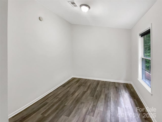 7210 Morningdew Ct, Denver, NC 28037 - spare room featuring dark wood-type flooring and baseboards
