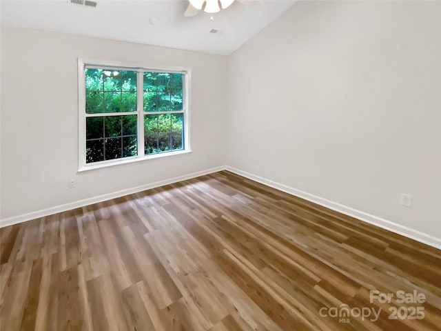 7210 Morningdew Ct, Denver, NC 28037 - unfurnished room with baseboards, wood finished floors, vaulted ceiling, and a ceiling fan