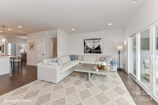 living room with light hardwood / wood-style flooring