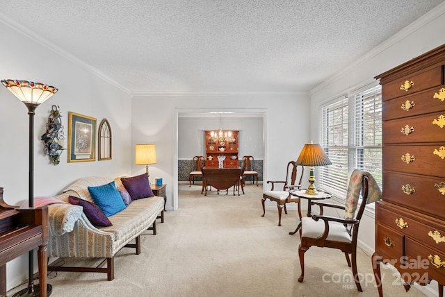 sitting room featuring light colored carpet, a textured ceiling, crown molding, and an inviting chandelier