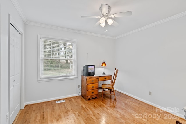 home office with ceiling fan, light wood-type flooring, and ornamental molding