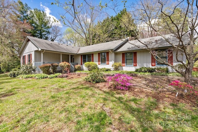 ranch-style house with a front yard