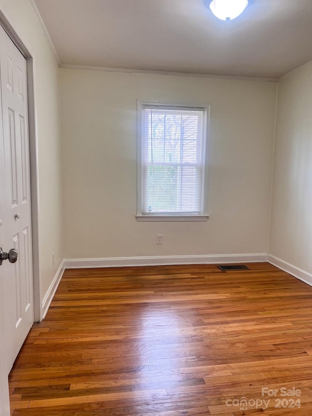 empty room with light wood-type flooring