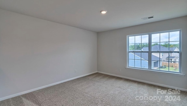 view of carpeted spare room