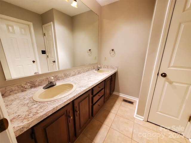 bathroom featuring vanity and tile patterned flooring