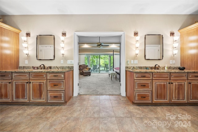 bathroom featuring tile flooring, ceiling fan, and double sink vanity