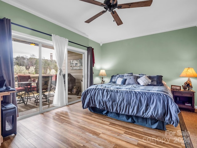 bedroom featuring crown molding, light hardwood / wood-style floors, ceiling fan, and access to outside