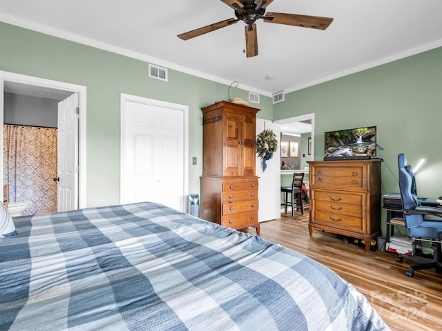 bedroom featuring connected bathroom, ceiling fan, a closet, ornamental molding, and light hardwood / wood-style flooring