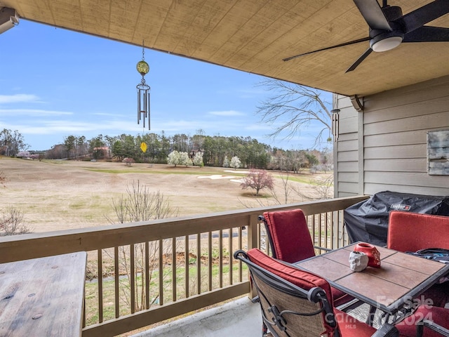 wooden terrace with ceiling fan