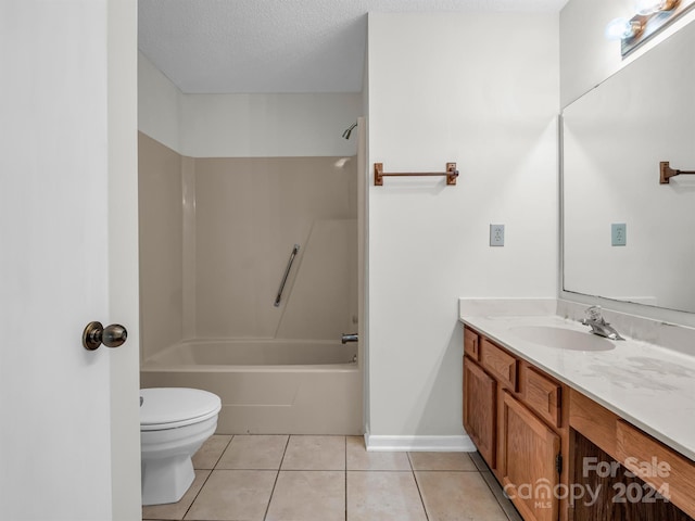 full bathroom with toilet, a textured ceiling, vanity, tile floors, and shower / washtub combination