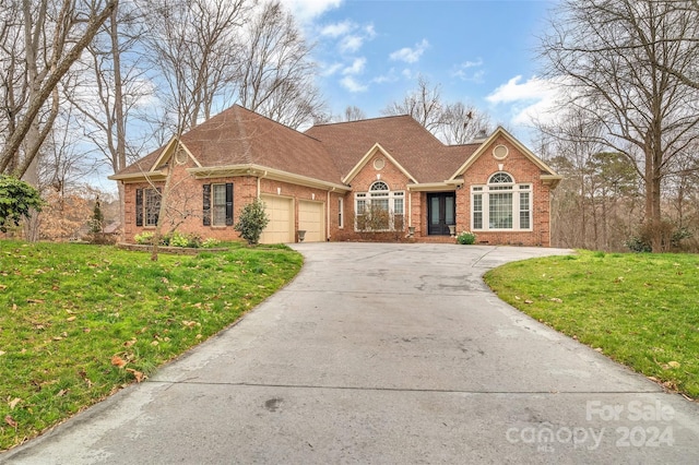 view of front of home with a front lawn