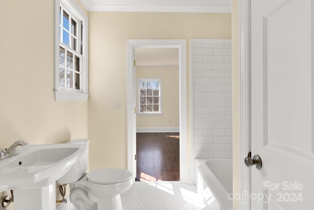 full bathroom featuring toilet, bathtub / shower combination, sink, tile floors, and ornamental molding