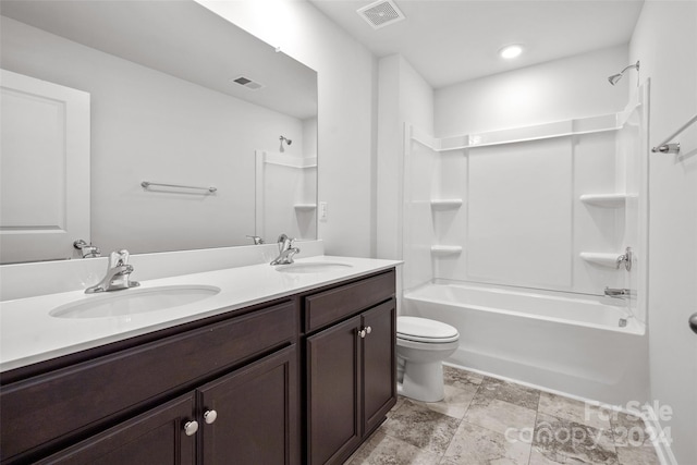 full bathroom featuring shower / bathing tub combination, toilet, tile floors, and dual vanity