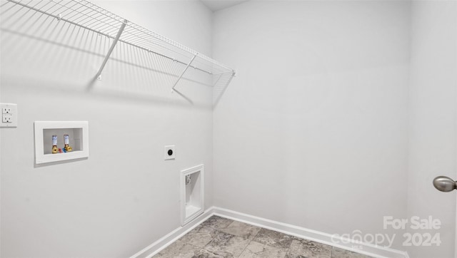 laundry room with hookup for an electric dryer, hookup for a washing machine, and light tile floors